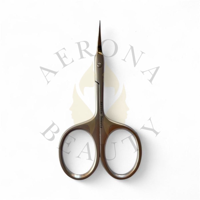 Stainless steel cuticle scissors with sharp curved blades and double finger rings.
