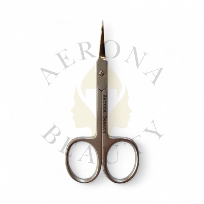 Stainless steel cuticle scissors with sharp pointed blades for precise nail trimming.